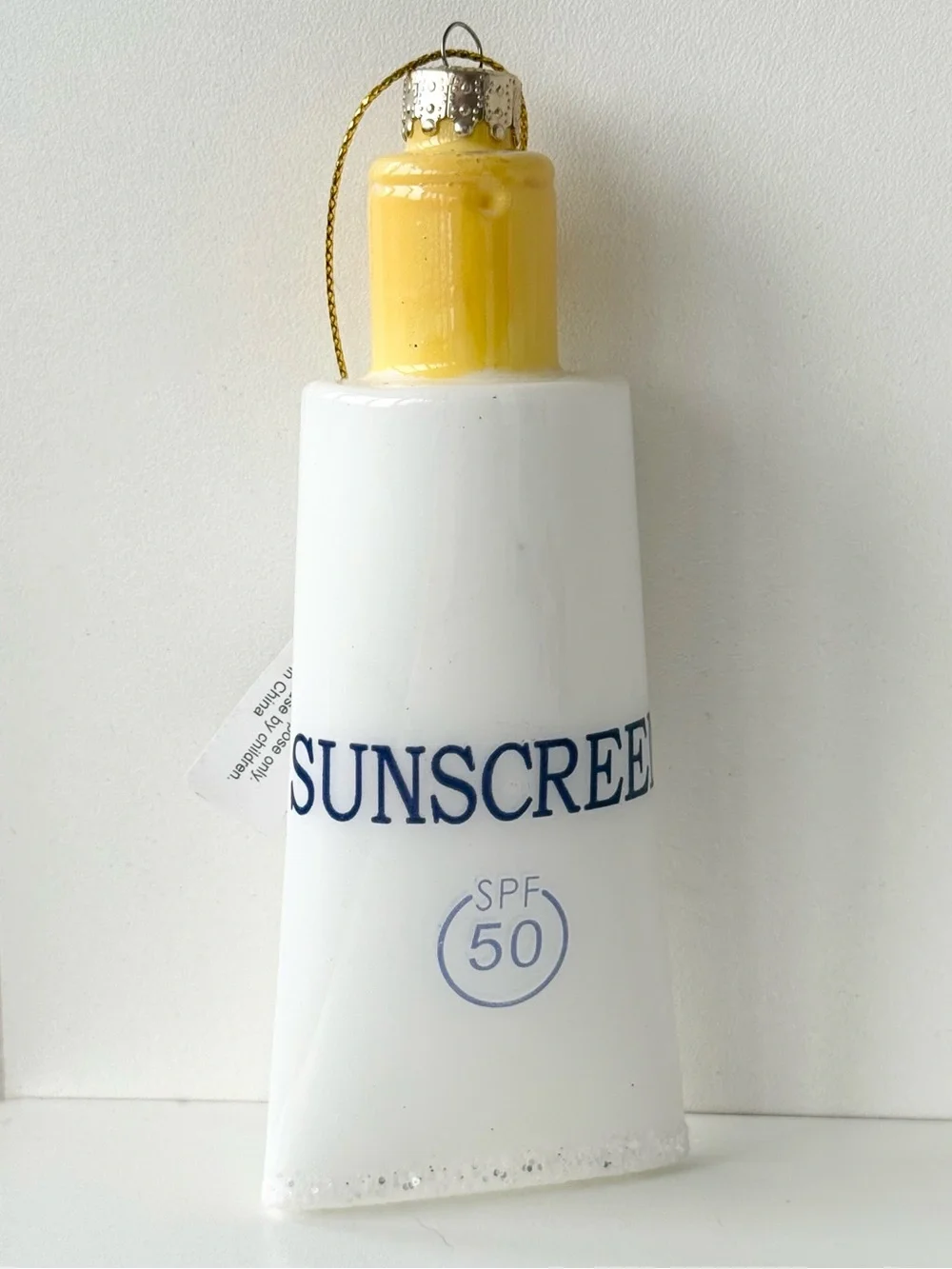 Bloomingdale’s Sunscreen SPF 50 Glass Christmas Ornament NWT